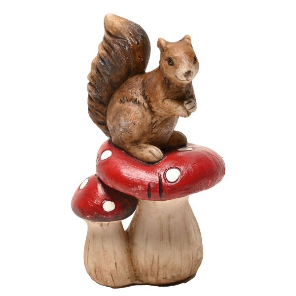 SQUIRREL STANDING ON MUSHROOMS O/MENT